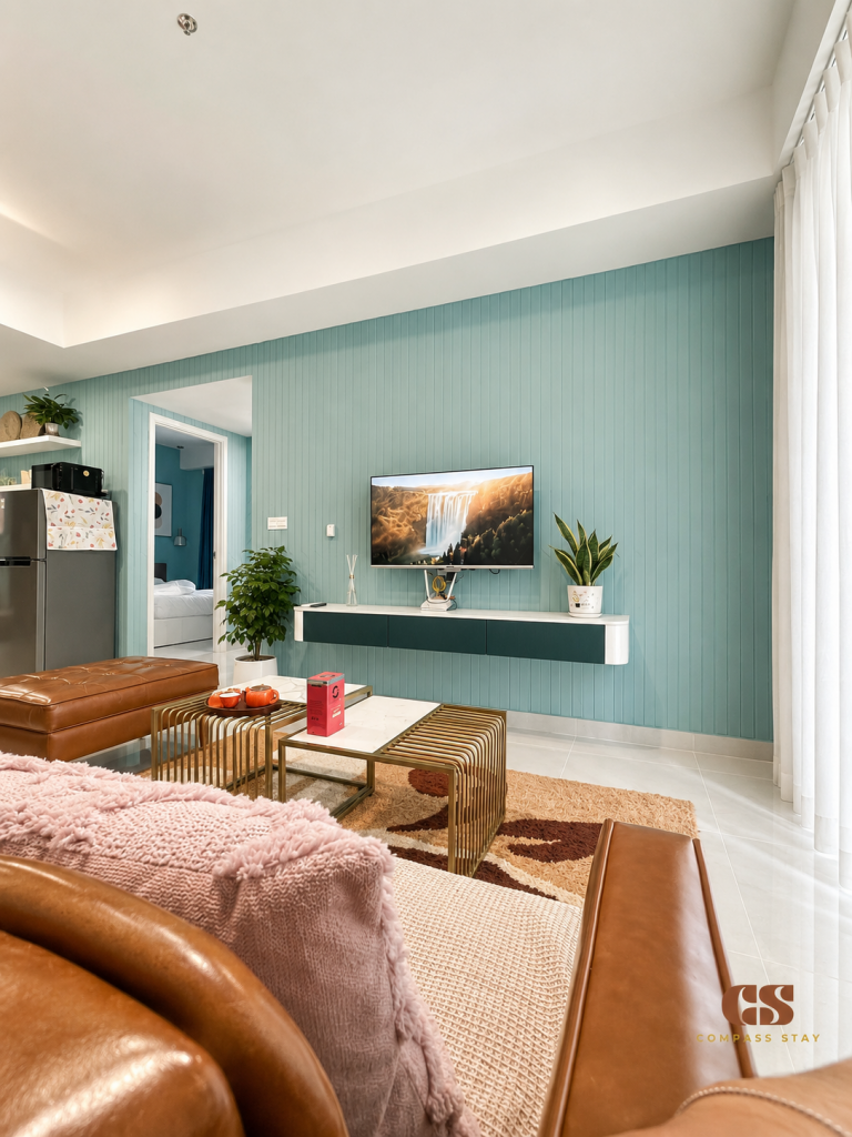Quiet serviced apartment bedroom with natural light and a work area for digital nomads in District 1 HCMC